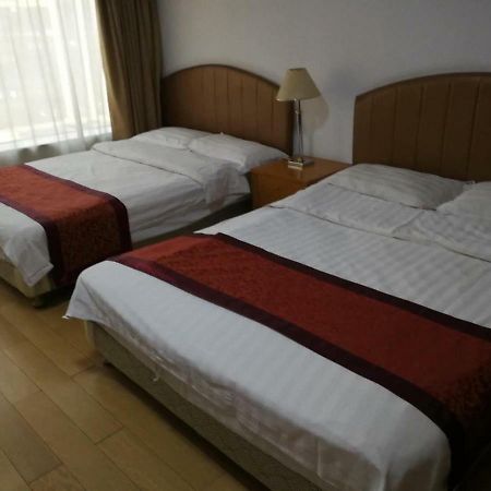 Beijing New World Centre Aparthotel Extérieur photo