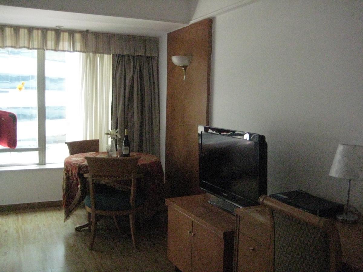 Beijing New World Centre Aparthotel Extérieur photo