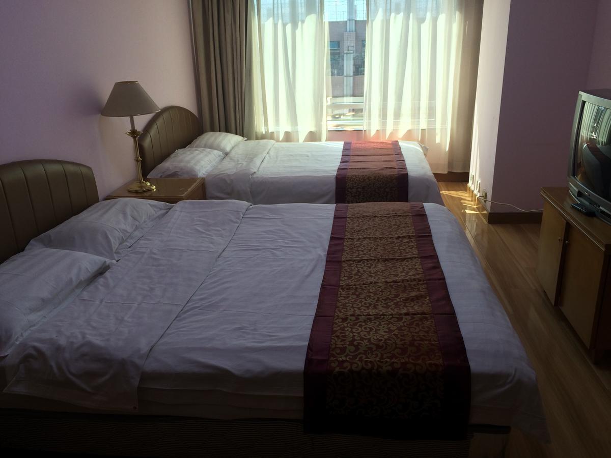 Beijing New World Centre Aparthotel Extérieur photo